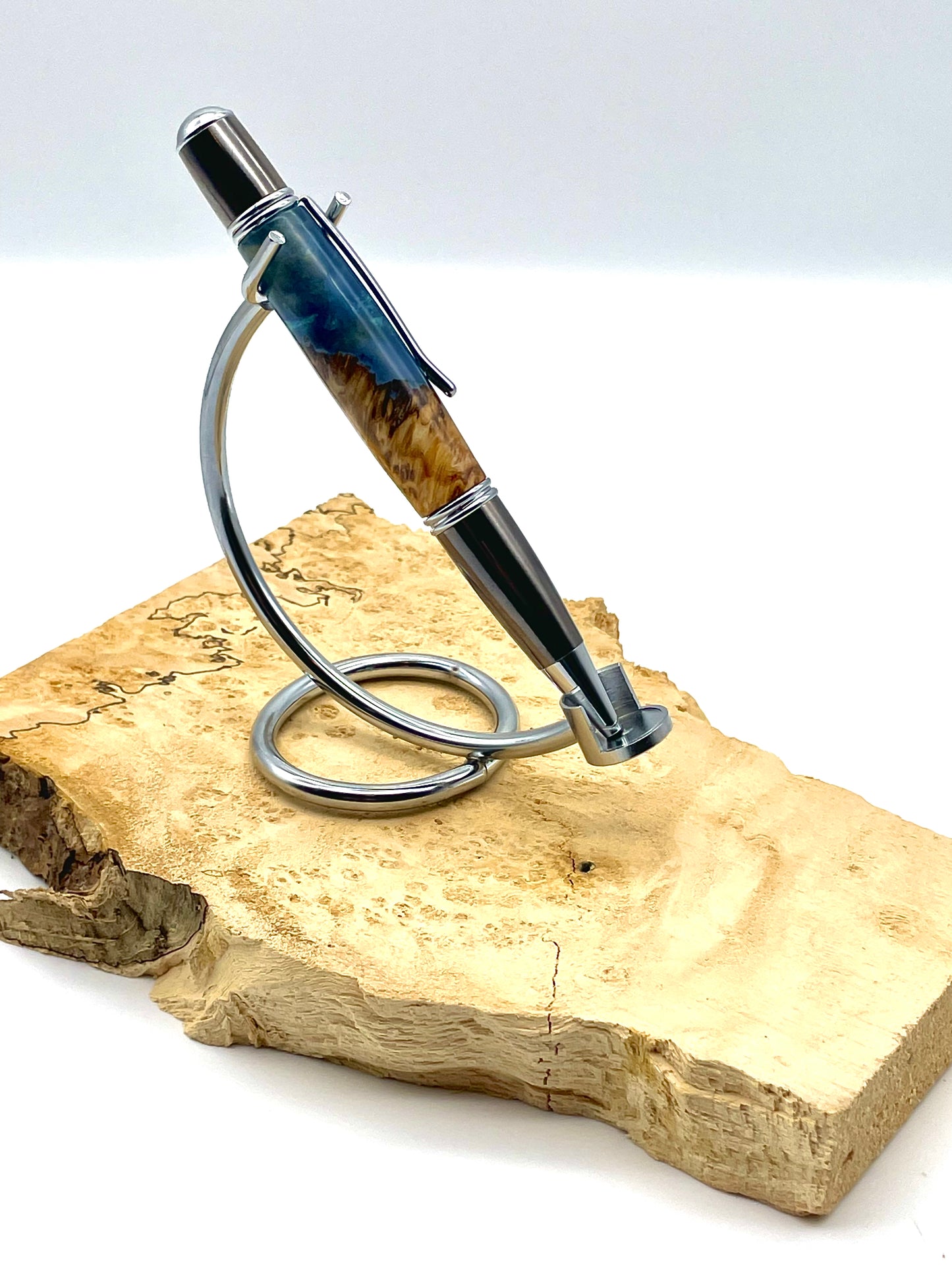 Blue and Gunmetal/Chrome Ballpoint Gatsby Grande Twist Pen; Epoxy resin and cottonwood burl; Hand casted and hand turned